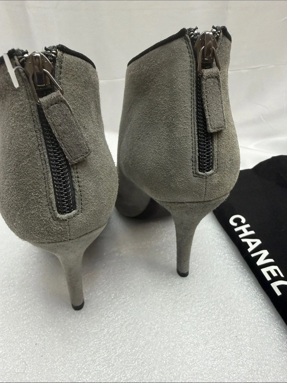 CHANEL Grey Suede Ankle Boots with Black Cap-Toe and Logo